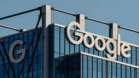 Shutterstock The Google logo in white lettering is visible on a dark glass office building in the US city of Atlanta, Georgia