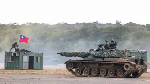 Getty Images Taiwanese soldiers take part in a drill at the Hukou base in Hsinchu on January 7, 2025