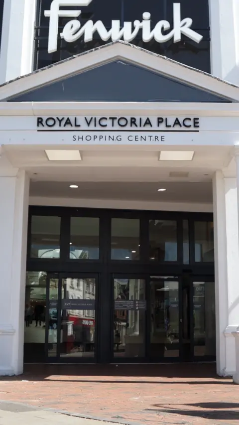 The entrance to Royal Victoria Place shopping centre.