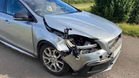 Car damaged after deer crash