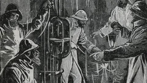 Getty Images Black and white image of workers digging out the Severn Tunnel