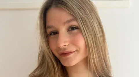 MOLLIE PEARCE Mollie Pearce smiling at the camera