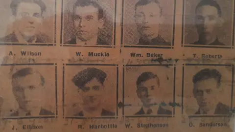 A newspaper cutting showing head shots of the eight miners who were imprisoned following the derailment