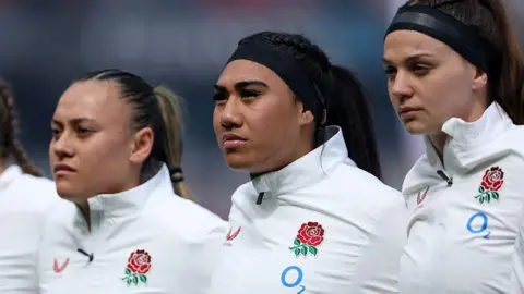 Getty Images Haineala Lutui at the start of the match during the national anthems with team mates. 