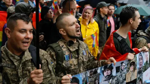 EPA/Sergey Dolzhenko Viktor is seen astatine  Pride march successful  Kyiv