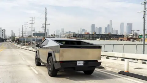 A Tesla Cybertruck during a test drive in Los Angeles, California, US, on Friday, Feb. 16, 2024.