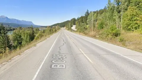 A Google Maps view of Highway 95, an open stretch of road with an undivided central reservation.