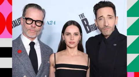 Getty Images Guy Pearce, Felicity Jones and Adrien Brody attend the Los Angeles premiere of A24 "brutalist" On December 05, 2024 at the Vista Theater in Los Angeles, California. 