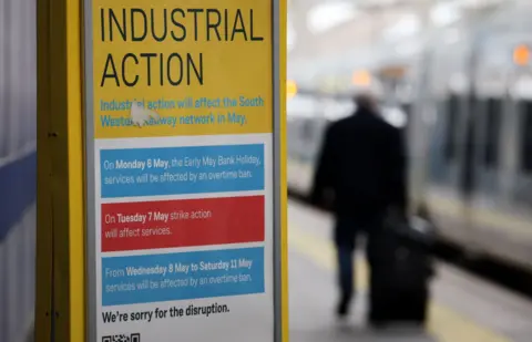 PA Media Industrial action sign at Charing Cross station