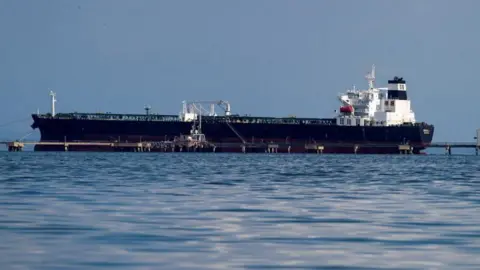 Reuters Oil tanker Kerala, chartered by Chevron, is being loaded in the Bajo Grande oil terminal at Maracaibo Lake, in the municipality of San Francisco, Venezuela, January 5, 2023.