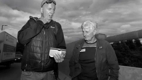 Roger Tiley Alan Jones and Ron Stoate on bridge to the old coking works