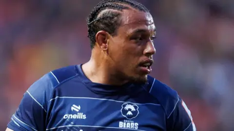 Gabriel Oghre looks on during a match for Bristol