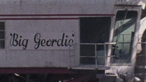 An excavator with the words 'Big Geordie' on its side.