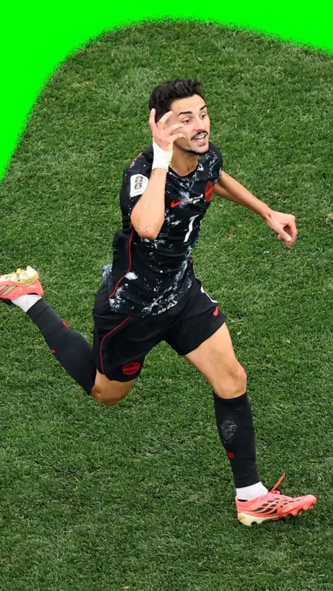 Stephen Eustaquio runs to the crowd after scoring the only goal of the match for Canada against South Africa.