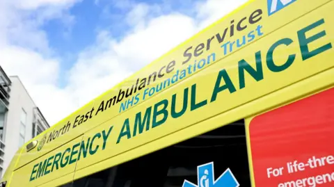 BBC Close up of the branding on a North East Ambulance Service ambulance