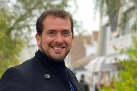 Liberal Democrats Liberal Democrat candidate Tim Bearder in a black suit and blue tie