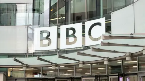 Getty Images BBC Broadcasting House's front entrance with the BBC logo (London)