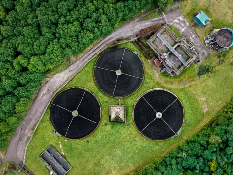 Getty Images An aerial view of a sewage treatment plant.