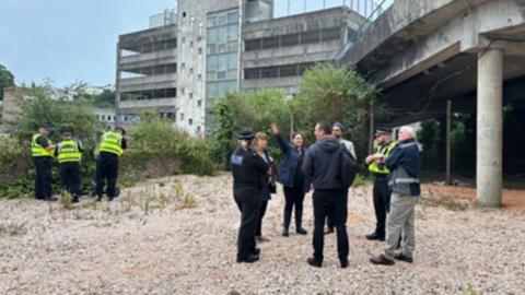Police officers having a meeting in Torquay