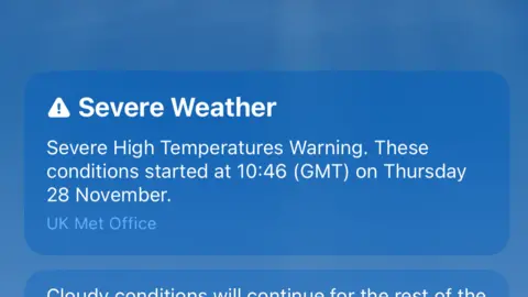 Supplied Screenshot of the severe weather alert test warning - the text reads 'Severe High Temperatures Warning. These conditions started at 10:46 GMT on Thursday 28 November'.