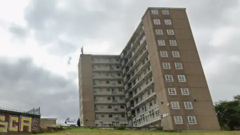 A close-up of a 10-storey towerblock 