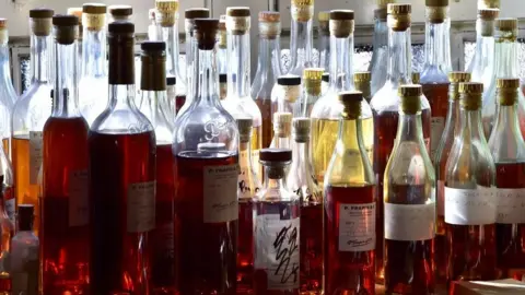 Getty Images The US has added tariffs on certain cognac and other grape brandies from France and Germany.
