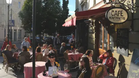 Sean Gallup Cafe-goers in Vilnius