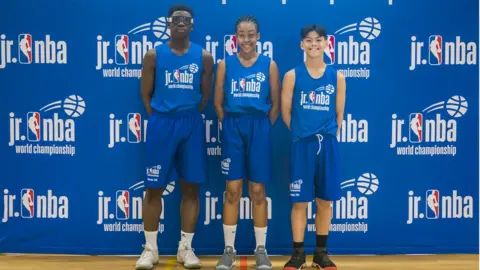 Daniel Jamieson/NBAE Demi, Tinu Fakunle and Marc Mendoza