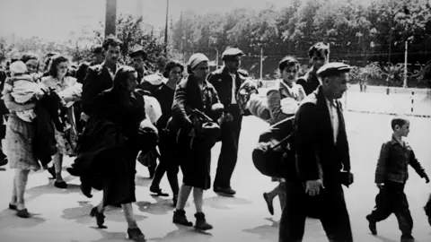 Getty Images Jewish families head towards US-controlled zones in Austria - near Bratislava, 1946