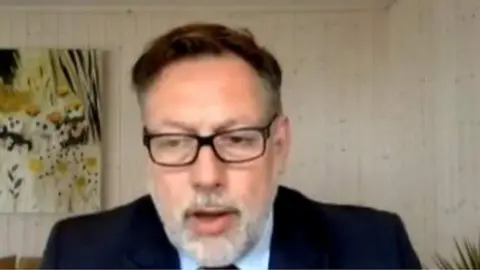 NI Assembly Christian Benson of the TSS briefed assembly members