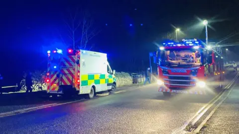 BBC Ambulance and fire truck at incident scene in Peterhead