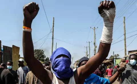 Daniel Irungu/EPA-EFE/REX/Shutterstock A man holding both arms up - 21 July 2023