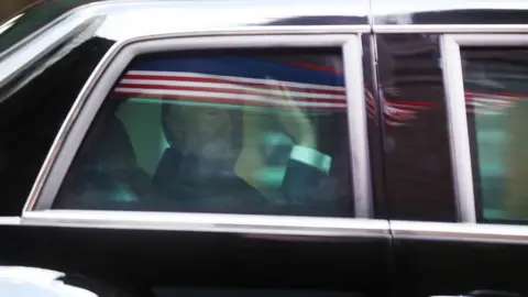 Getty Images Trump in car