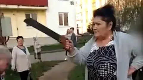VKontakte Woman with saw in Russia