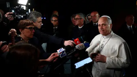 Reuters Pope Leo speaks to journalists outside his residence in Castel Gandolfo, Italy (7 April 2026)