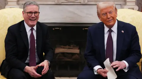 PA Media Keir Starmer and Donald Trump sitting in the Oval Office.