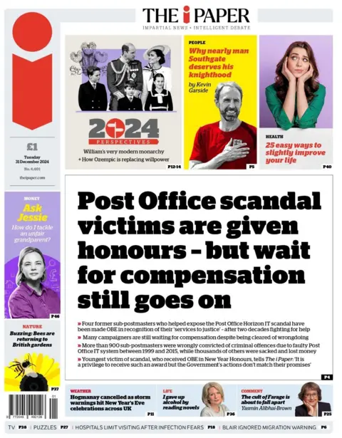 Post Office scandal victims are given honours - but wait for compensation still goes on, reads the front of the i newspaper 