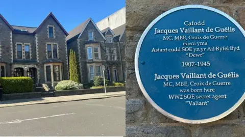 BBC Wales Side by side: to the left is a large three storey stone house in Museum Place, Cardiff, in which Jacques Vaillant de Guélis was born. To the right is a close-up of the circular Blue Plaque with a silver edge, on the same house. It commemorates his life and achievements.