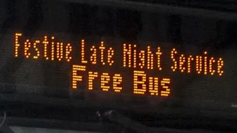 Aberdeen City Council Bus sign saying 'Festive Late Night Service Free Bus'