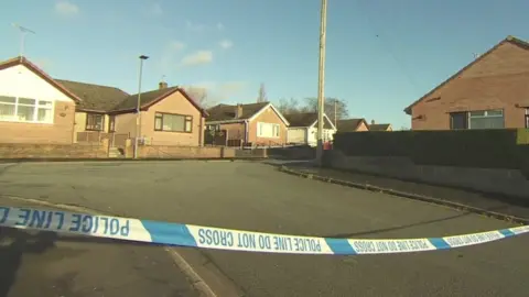 Police tape at the scene on Kilburn Drive, Shevington