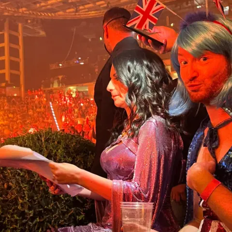 Aled Aled with Laura Pausini in 2022