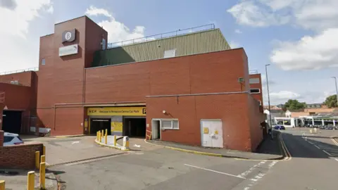 Car park comprising of a brick building