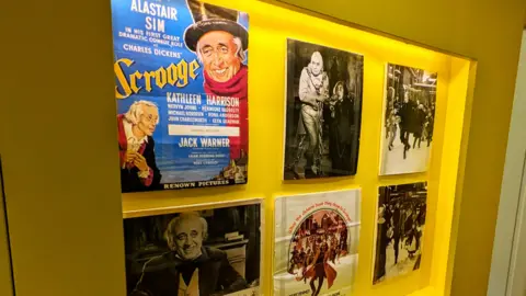 Charles Dickens Museuem Posters advertising the 1951 film of Scrooge are framed and exhibited in the Charles Dickens Museum.