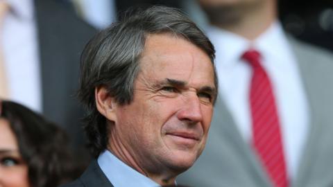Alan Hansen in the stands at a game