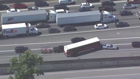 Hijacked bus in Atlanta crashes into car on highway