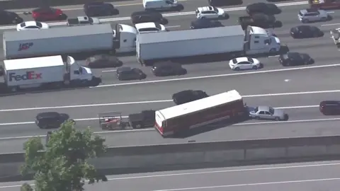 Hijacked bus in Atlanta crashes into car on highway