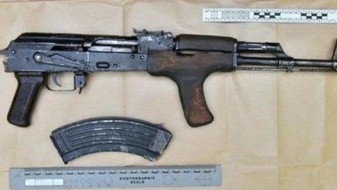 Shows assault rifle and magazine 