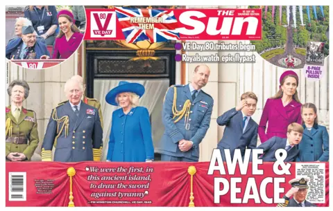  "Awe & Peace", in reference to the 80th anniversary celebrations of VE Day. The photo features several members of the Royal Family on the balcony of Buckingham Palace. 
