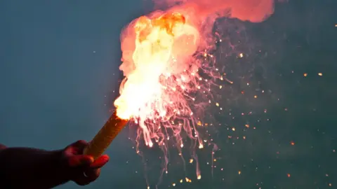 Getty Images An ignited safety flare