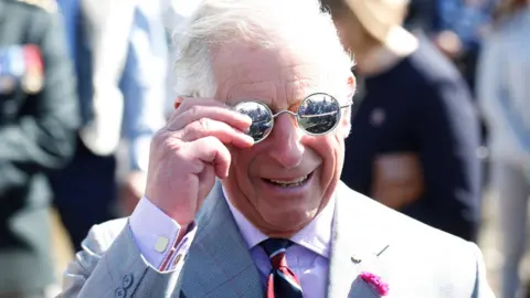 Reuters Prince Charles wearing the silver snow goggles